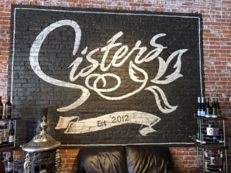 Sisters Cafe |Ayat logo