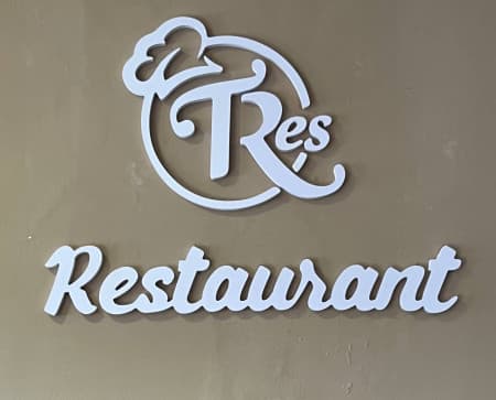 Tres Restaurant logo